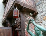 French store front and statue