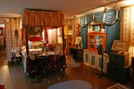 Early American Bedroom view towards bathroom