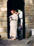 Joe kissing Ren in the courtyard