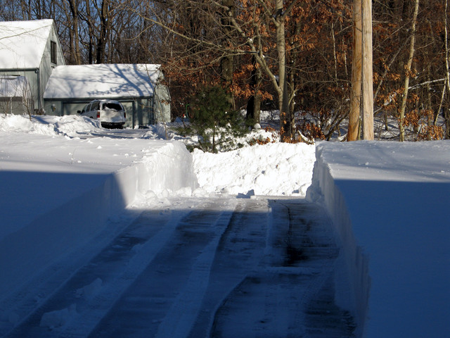 Neighbors across the street have a snow tractor