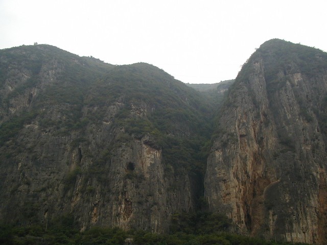 More caves in the cliff side