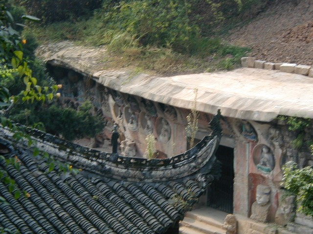 Gaze behind the roof towards carvings below