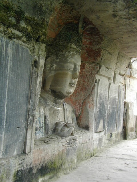 Buddha between ancient scripts