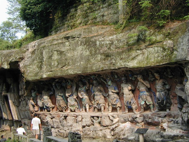 Celestial guardians under cliff near entrance