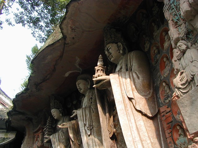 Standing saints from the Huayen sect of Buddhism - Left-Manjusri mid-Vairocana right-Samantabhadra.
