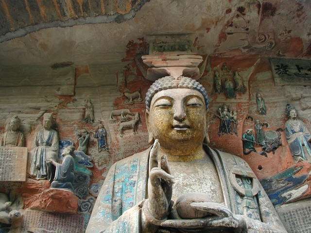 Smiling buddha gazing at visitors