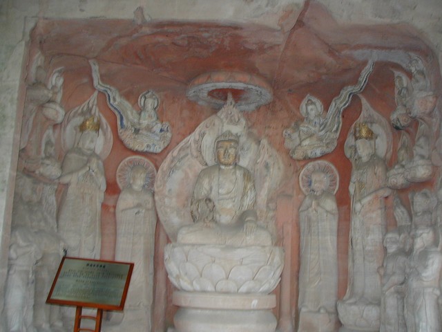 Gold faced buddha in a lotus flower