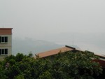 The haze in Chongqing is substantial.  Magnetic train lines are in the works.