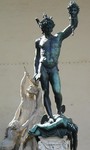 Medusa head statue near Uffizi with base statues
