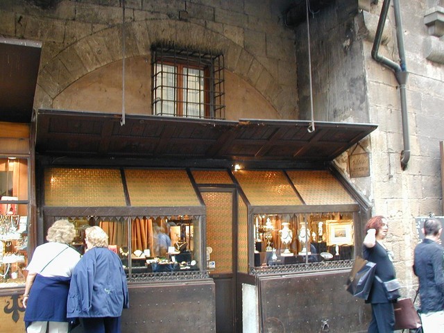 bottle bottoms and metal frame storefront on Ponte Vecchio