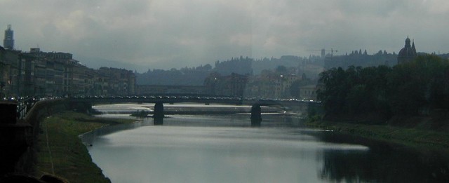clouds and bridges over the Arno River