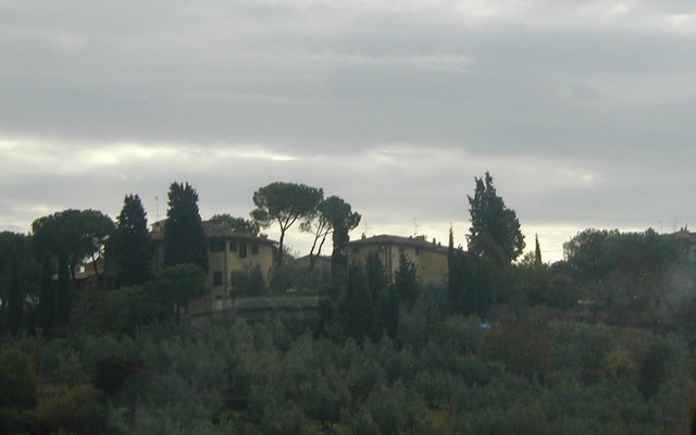 clouds over Tuscan villas