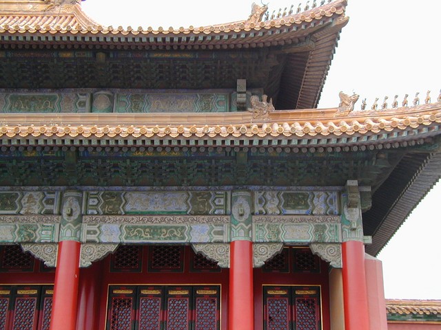 The red walls, pillars and yellow glazed roof-tiles, and beams are decorated with designs of dragons, phoenixes and geometric figures.