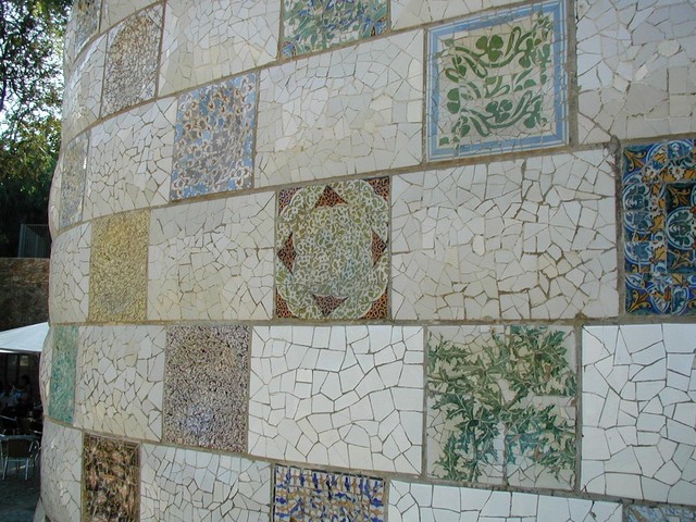 Wall of plates in mosaic