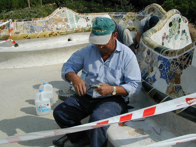 Workers repair bench