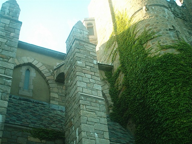arches and slate roof above backlawn stairs