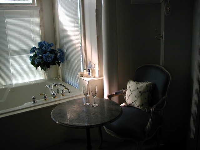 sitting area near a tub in another guest room
