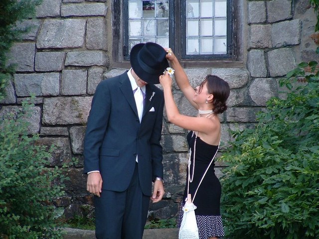 Spike getting a flower in his hat from Nicole