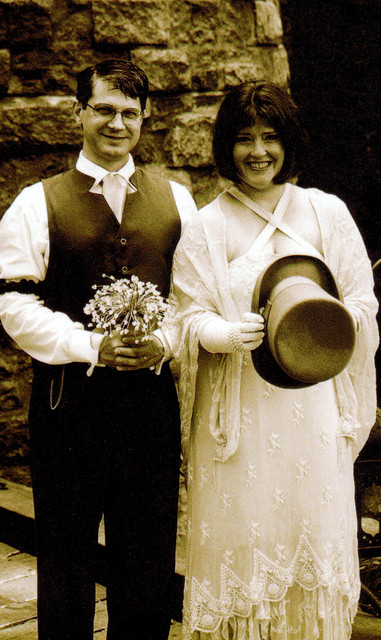 Joe and Ren with bouquet and top hat reversed