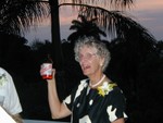 Cazs Mom poses with Red Stripe bottle