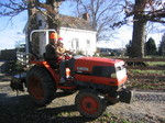 riding around on Ella's Great Grandfather's tractor