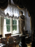 female statue in lilac room
