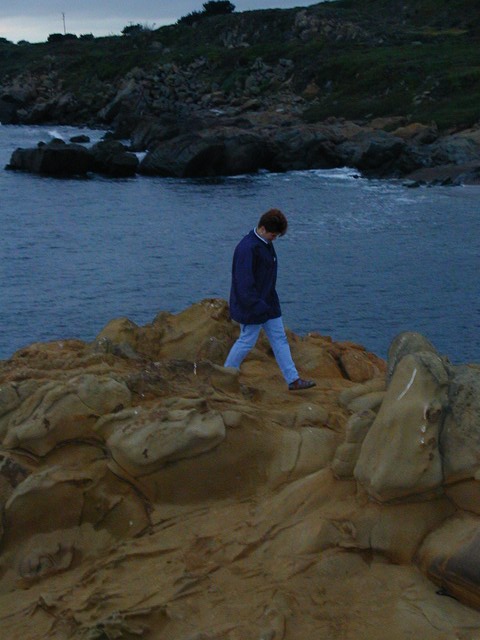 Ren walks off the rocks