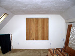 former window in master bedroom