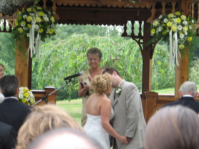 Brian kisses his bride Sue