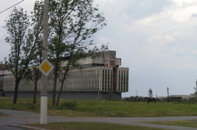 empty ugly Stalin bldg and horse