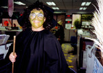Mom in the wicked witch Halloween costume