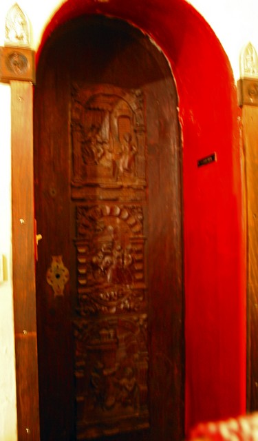 wooden door going into a room not on the map