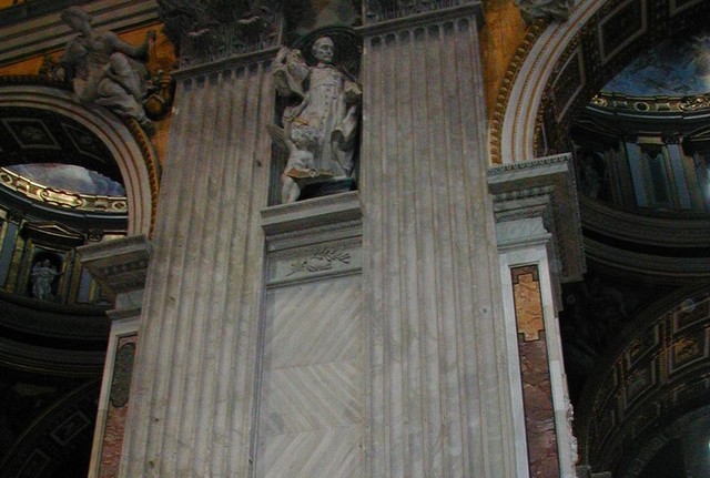 Statuary near the ceiling domes