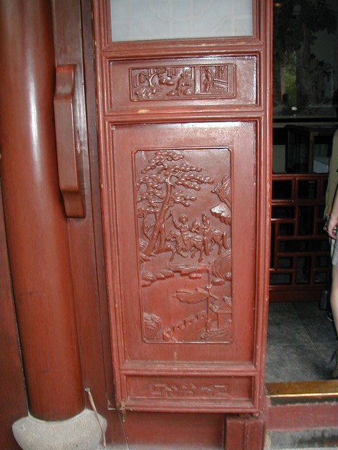 Carved red lacquer door inset