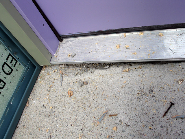 need to fill concrete near garage side door