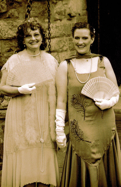 Susan and Jen close-up on the drawbridge in sepia