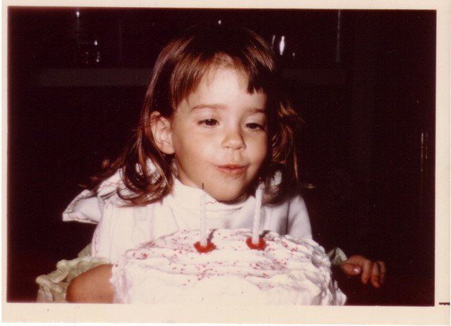 Ren blowing out candle