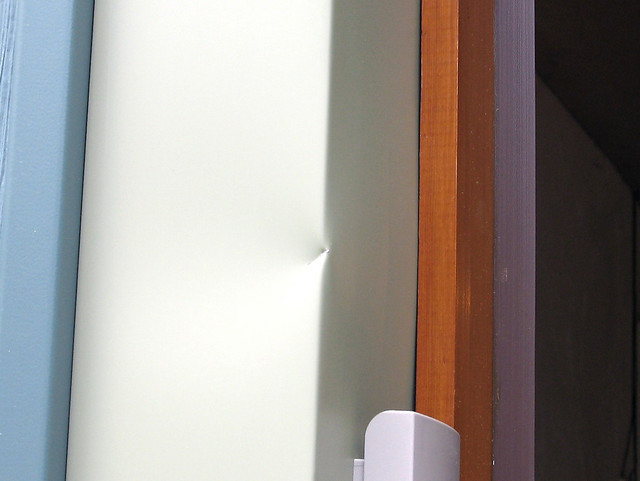 left door - dent above id box