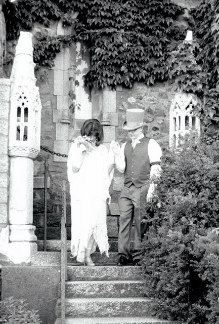 Ren and Joe in black and white descending stairs