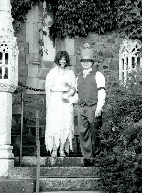Ren and Joe on stairs in black and white
