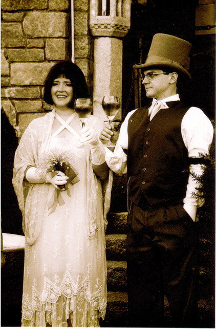 Ren and Joe toasting during the ceremony in sepia